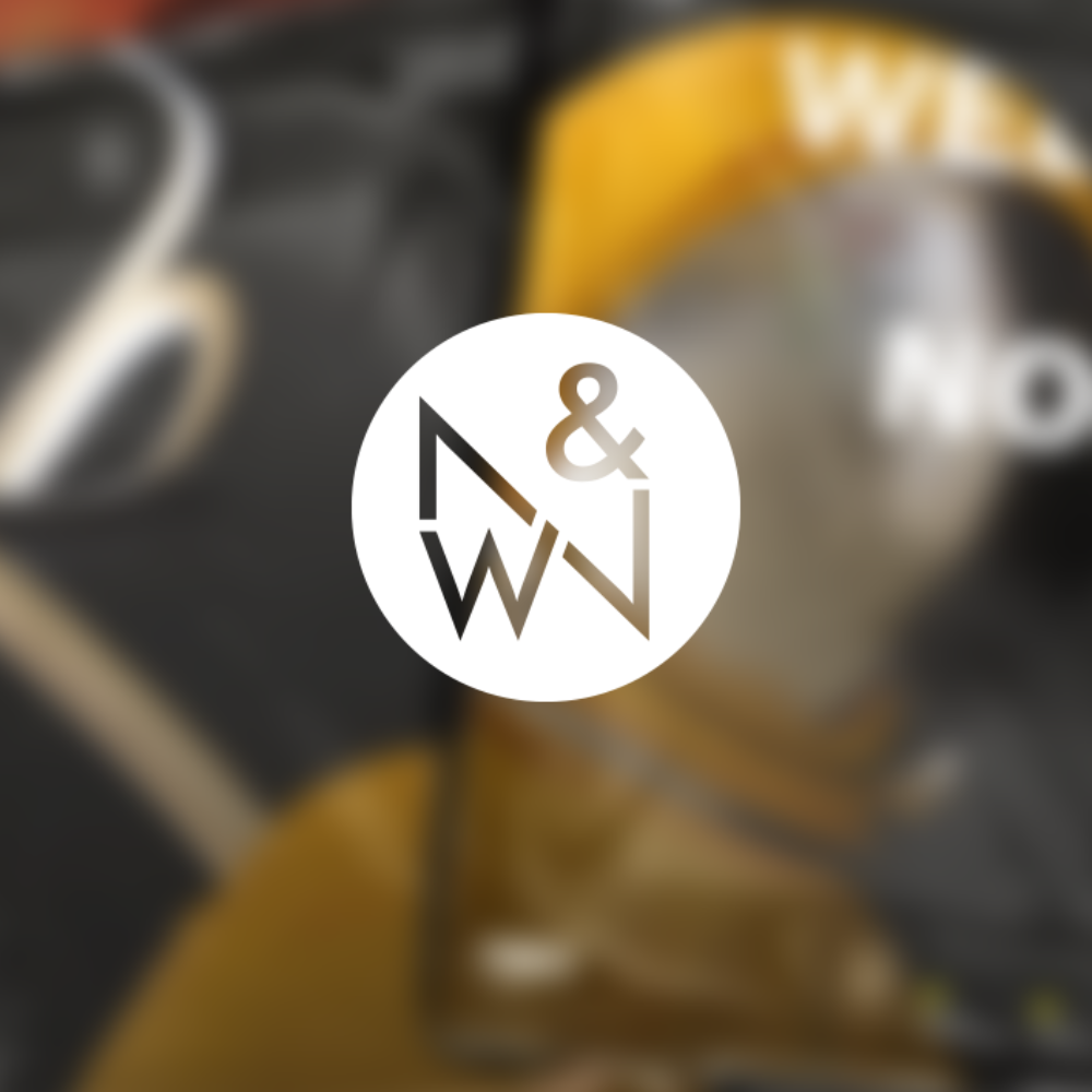 Weder & Noch Logo vor blurry Magazin